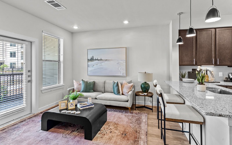 living room with access to private balcony