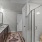 bright bathroom with glassed, walk-in shower