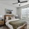 carpeted bedroom with large window