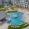 swimming pool next to covered patio
