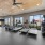 large gym surrounded by bright windows