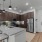 an open kitchen with stainless appliances and designer finishes