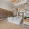 well lit leasing lobby with brick wall