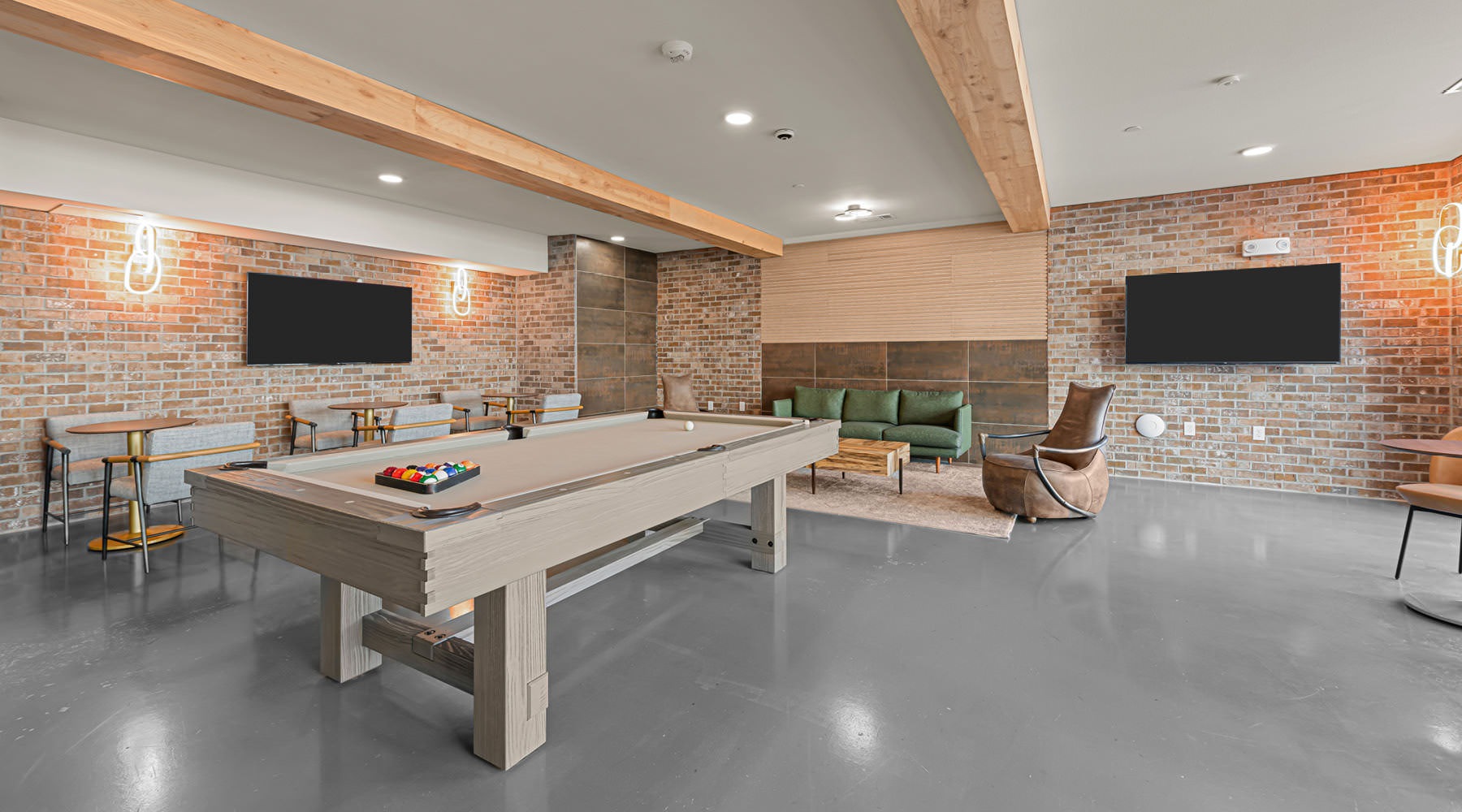 Live Beautifully game room with billiards table